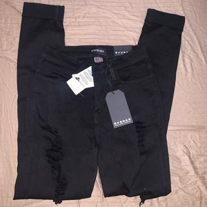 Black Fashion Nova ripped Jeans